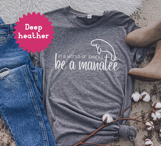 In A World Of Sharks Be A Manatee Shirt